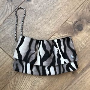 NWOT Henri Bendel animal leaped clutch